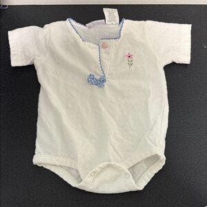 White Baby Onesie with Embroidered Flower and Blue Trim y2k